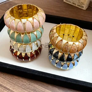 Detailed view of French marble acrylic geometric elastic bracelets in multiple elegant colors