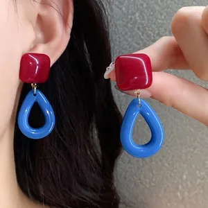 Vibrant retro resin drop earrings in red and blue, dopamine style fashion jewelry