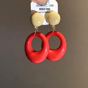 Retro red and beige oval resin drop earrings with silver needles for women fashion style