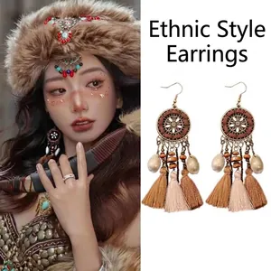 Vintage Bohemian tassel drop earrings with geometric design and ethnic charms for women