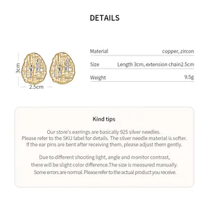 Detailed specifications of oval hollow gold-plated earrings with zircon inlays.