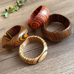 Set of chunky retro patterned wooden bangles with unique grain designs for women
