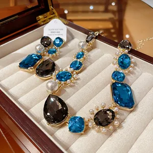 Close-up of vintage French luxury teardrop crystal and pearl necklace in jewelry box