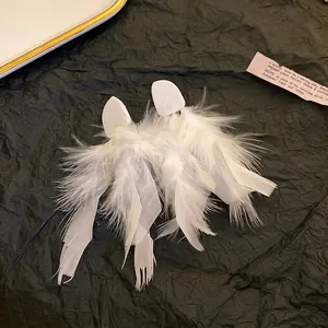Elegant white feather tassel earrings with silver needle, luxury statement jewelry for women