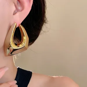 Statement gold-plated irregular geometric hoop earrings for a bold fashion style