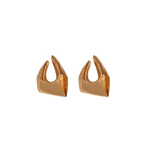 Pair of irregular geometric gold-plated earrings with a minimalist metallic finish
