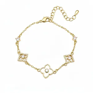 Elegant 18k gold plated bracelet with clover floral and square zirconia charms