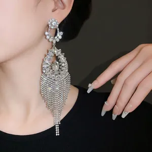 Elegant silver needle rhinestone flower and water drop tassel earrings for women