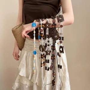 Bohemian ethnic style cowhide wood bead waist chain featuring irregular geometric shapes