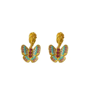 Vintage gold butterfly earrings with colorful crystals and silver needles for women