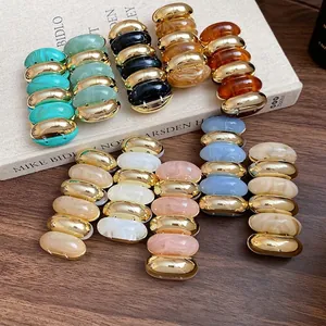 Acrylic marbled oval linked bracelet with vintage gold accents, retro bold design style