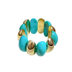 Retro chunky elastic bracelet featuring marbled turquoise acrylic and gold-tone oval beads
