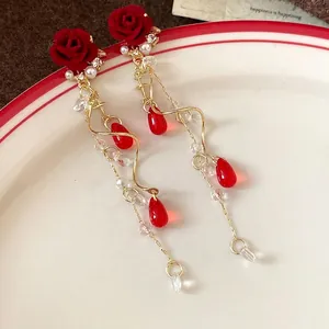 Vintage red flocked rose tassel earrings with pearls and gold wavy chains