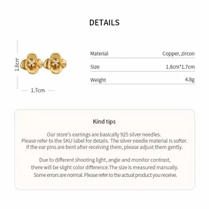 Close-up detail of golden flower stud earrings with material specs and 925 silver needle notice