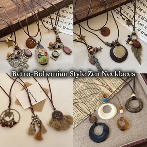 Vintage bohemian ethnic style necklace collection with wood beads and tassel pendant details