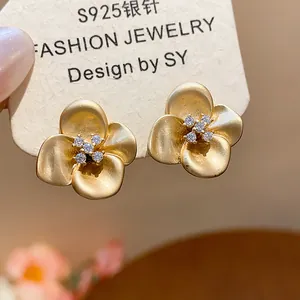 Vintage gold matte flower stud earrings with zircon centers and S925 silver needles