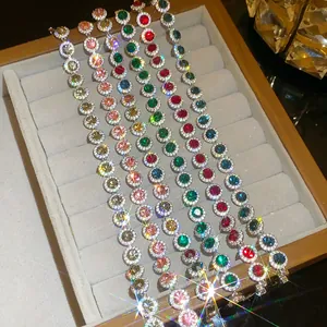 Detailed macro view of sparkling colorful cubic zirconia round bracelets in a velvet box