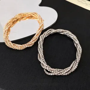 Elegant multi-layer rhinestone wrapped geometric bracelet featuring a luxury sparkling design
