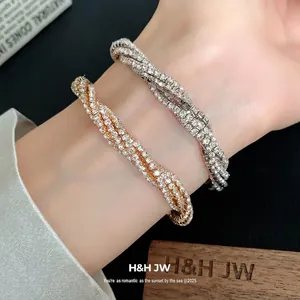 Elegant multi-layer twisted bracelet set with sparkling crystals in gold and silver