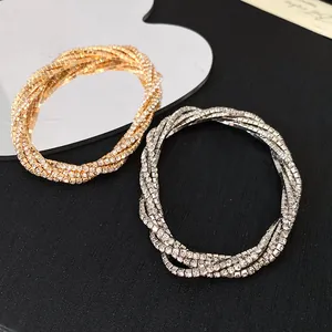 Elegant multilayer rhinestone twisted geometric bracelets in gold and silver finishes