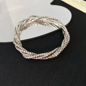 Elegant multi-layer rhinestone wrap bracelet in silver tone with brilliant shine.