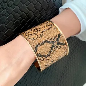 Vintage snake pattern leather wide cuff bracelet with metallic gold edges for women