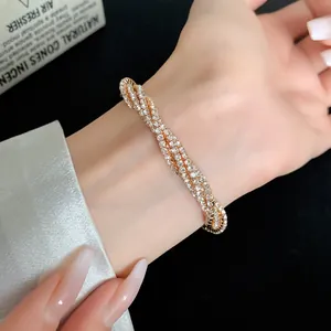 Detailed view of luxury multi-layer rhinestone wrap bracelet sparkling on wrist