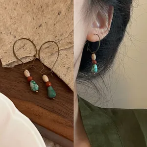 Handmade Bohemian vintage earrings with natural stones and green water-drop pendants