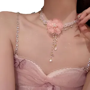 Elegant pink fabric flower necklace for women featuring crystal beads and pearl tassels
