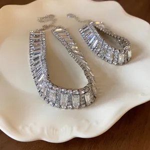 Detailed macro view of sparkling rhinestone geometric patchwork necklace for gala dresses