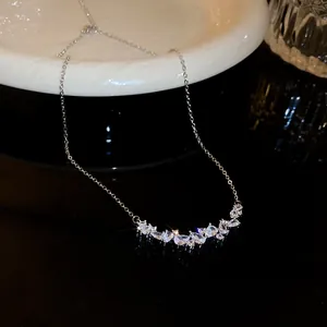 Close-up of elegant silver necklace with sparkling pear-cut zirconia stones
