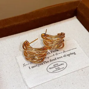 Gold-plated wrapped wire multi-layer stud earrings with a minimalist fashion design
