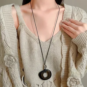 New Chinese Style Long Sweater Chain Resin Hollow Round Geometric Pendant Black Leather Cord Necklace for Women