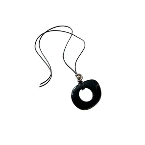Minimalist black hollow circular resin pendant necklace with long black leather cord