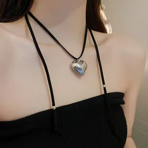Elegant silver heart pendant necklace with adjustable black drawstring cord for women