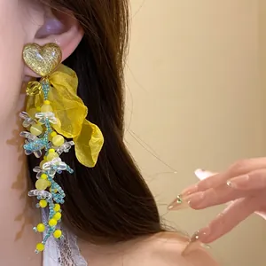 Eleganti orecchini a cuore con nappe in chiffon giallo e ago d'argento per stile vacanza