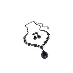 Elegant teardrop pendant necklace and earrings jewelry set with black sparkly rhinestones