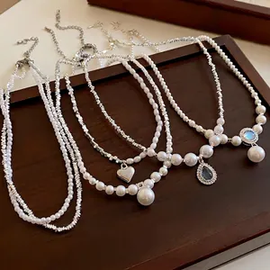 Ensemble de colliers en perles de style vintage français avec pendentifs cœur et zircone