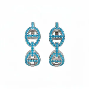 Elegant vintage pig nose hoop earrings with turquoise zircons in polished silver finish
