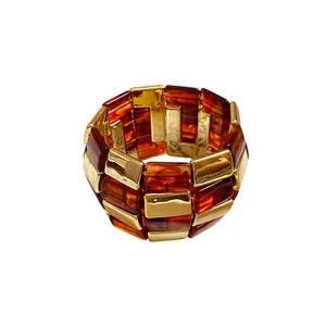 Bracciale segmentato di lusso in acrilico e metallo dorato per donna, stile unico