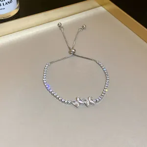 Detail view of butterfly zircon bracelet with adjustable sliding clasp mechanism
