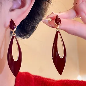 Elegant burgundy drip oil hollow teardrop drop earrings with vintage silver needles.