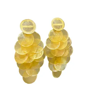 Yellow translucent layered disk drop earrings with resort style aesthetic