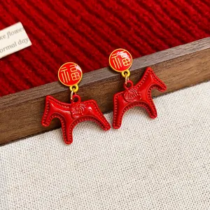 Elegant New Chinese style red enamel horse drop earrings with golden Fu character stud.