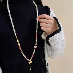 Elegante collana lunga in stile cinese con loto, farfalla e perle artificiali per donna