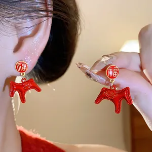 Traditional red enamel Dala horse drop earrings with Chinese Fu character stud detail