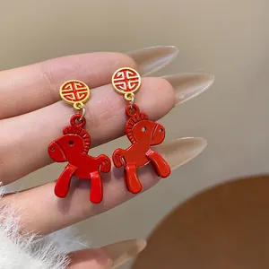 Red enamel horse dangle earrings with golden Chinese Fu character studs detail