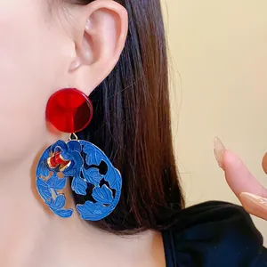 Detailed macro view of vintage resin flower and leaf earring in New Chinese style