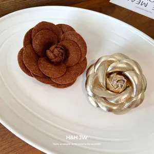 Elegant French style leather and flocked camellia flower brooches in white plate