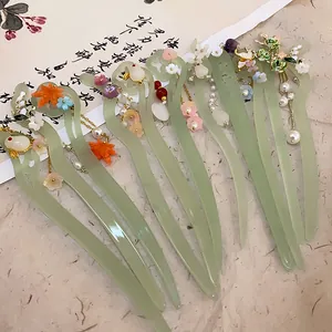 Detailed view of New Chinese style hairpins with floral and rabbit ornaments for Hanfu